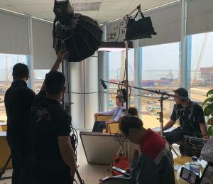 Bilingual interview setup with senior leadership for the Bureau Veritas customer success story