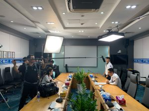 Bilingual interview setup with senior leadership