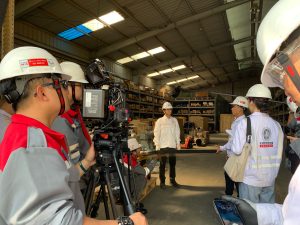 9G Pictures crew in full PPE filming inside warehouse
